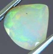 Tremendous glittering 1.23ct faceted Jelly Opal