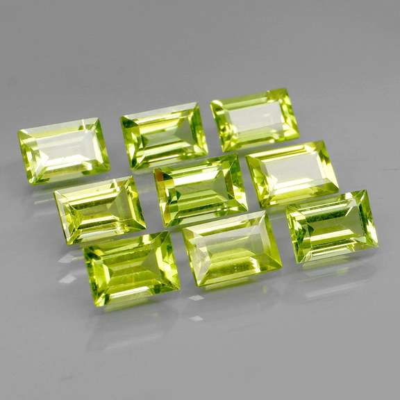 Brilliant 5.95ct 9pc set of matched baguette cut Peridot
