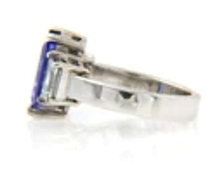 Quintessential Emerald Cut Tanzanite and Trapezoid Diamond Ring