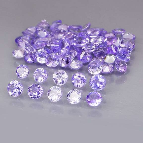 Glittering 4.36ct bright blue violet Tanzanite set