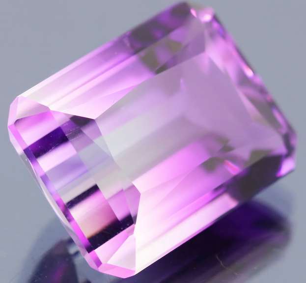 Beautiful 25.73ct top color created Ametrine