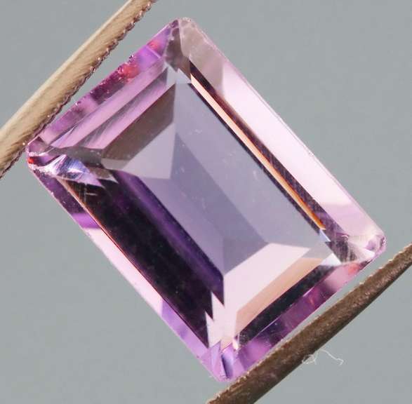 Bright violet 6.53ct emerald cut Amethyst
