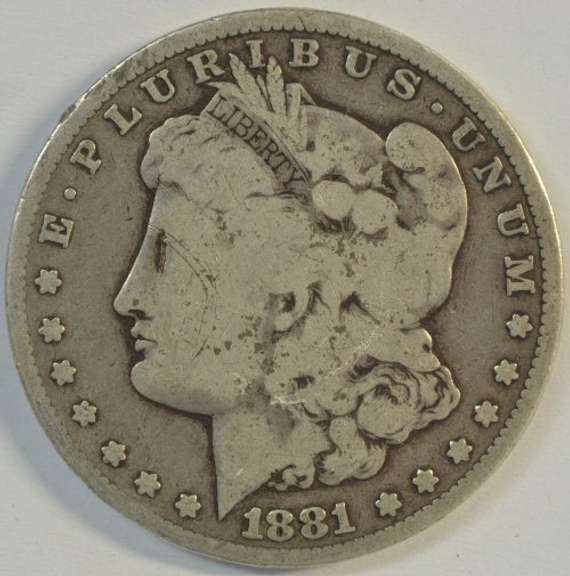 Rare Key date 1881-CC Morgan Silver Dollar. Circ