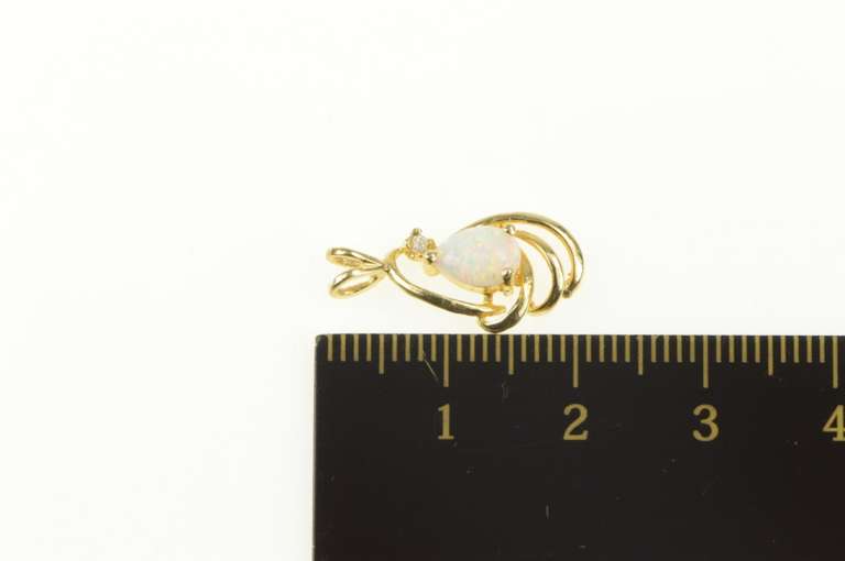 14K Yellow Gold Pear Syn. Opal Diamond Accent Classic Pendant