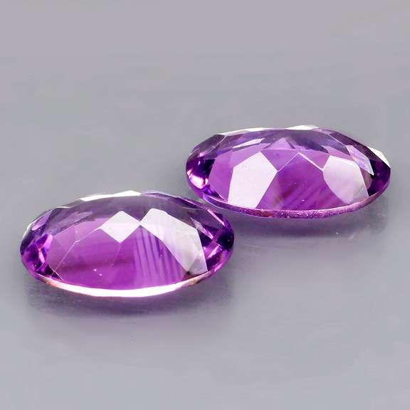 Glittering 8.78ct violet Amethyst pair