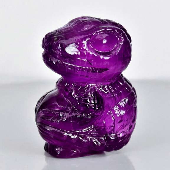 Very intricate and large 65.21ct untreated Amethyst Dinosaur!