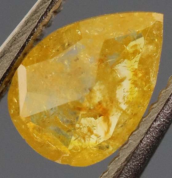 Rare .40ct pear cut golden Diamond