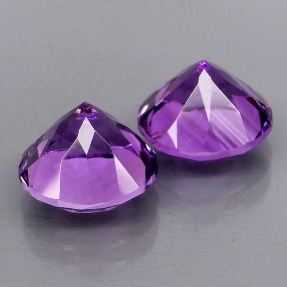 Stunning 6.43ct violet Amethyst solitaire pair