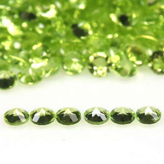 Diamond cut! Unheated! 11.95ct Peridot set