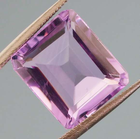 Bright violet 5.59ct emerald cut Amethyst