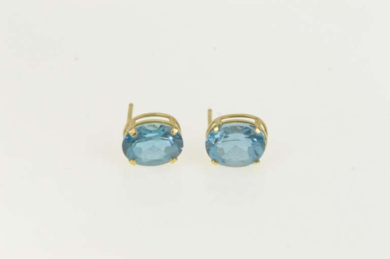 14K Yellow Gold Oval Blue Topaz Solitaire Classic Stud Earrings
