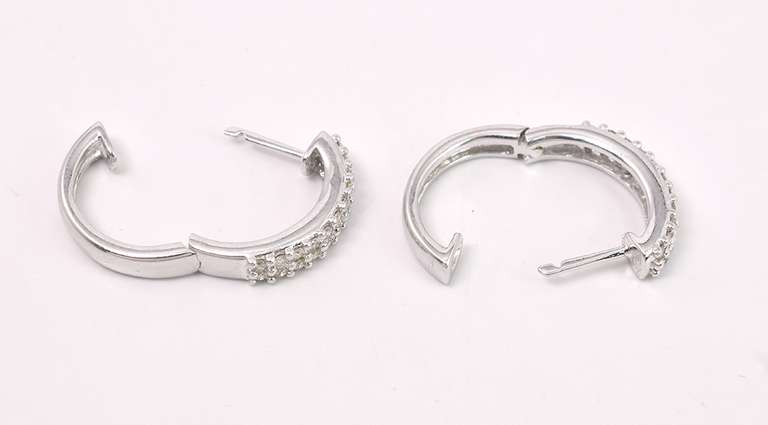 Simple Pair of Diamond Earrings In 14K Yellow Gold