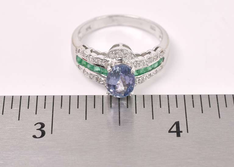 Sparkling Purple Tanzanite And Emerald Ring In 14K White Gold