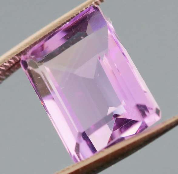 Bright violet 6.53ct emerald cut Amethyst