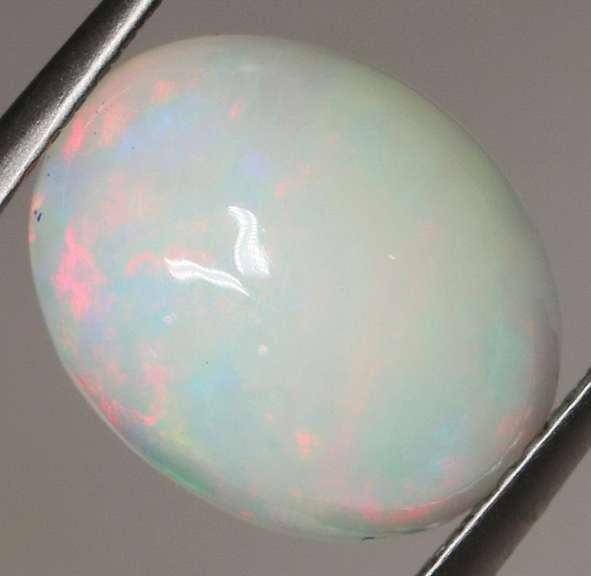 Beautiful 2.40ct rolling floral flashing Welo Opal
