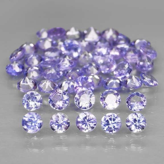 Heavy flashing 3.32ct diamond cut Tanzanite set