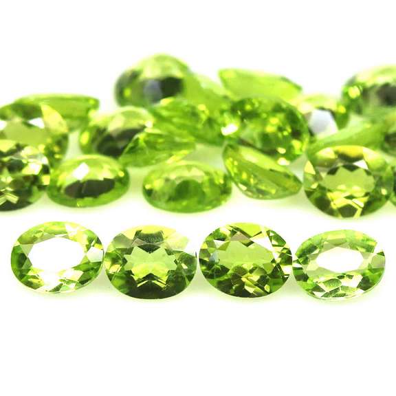 Dazzling 8.49ct untreated apple green Peridot set