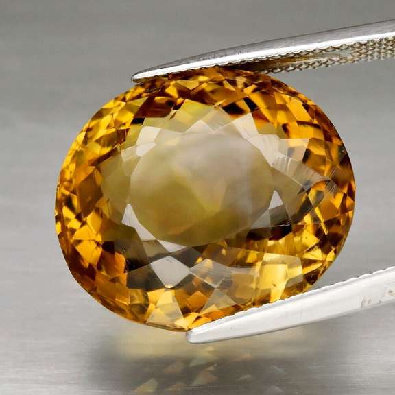Glistening 23.11ct oval cut rich golden Citrine