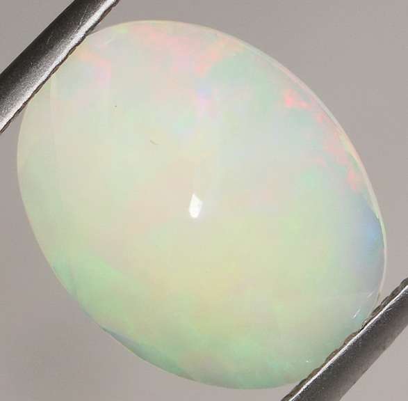 Full cover! 2.63ct rolling floral flashing Welo Opal