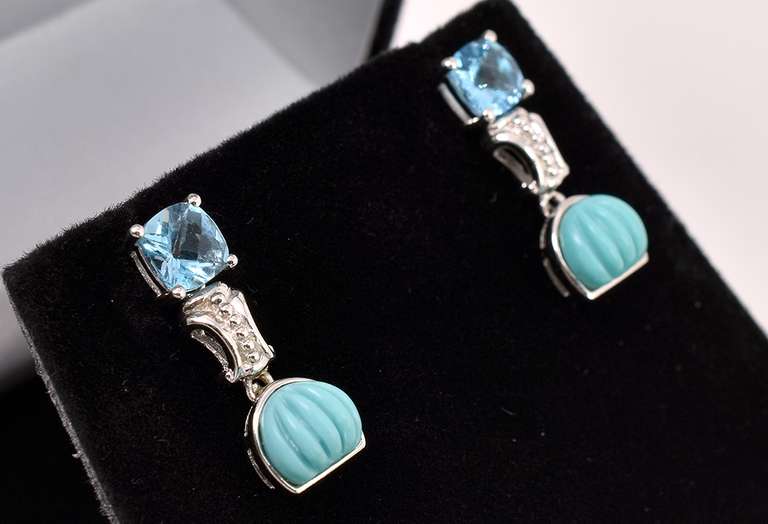Blue Topaz Dangle Earrings In Sterling Silver