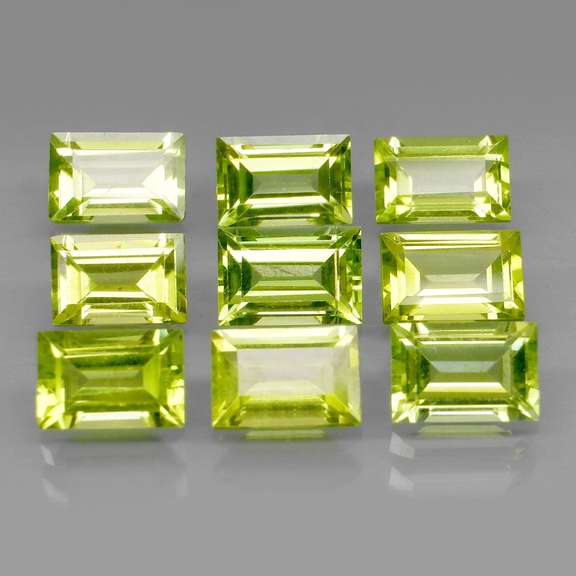 Brilliant 5.95ct 9pc set of matched baguette cut Peridot