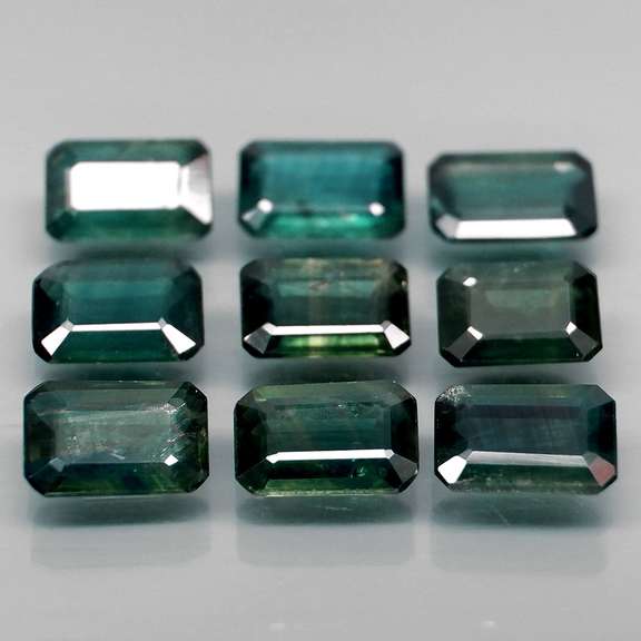 Heated only! 5.32ct blue green sapphire set