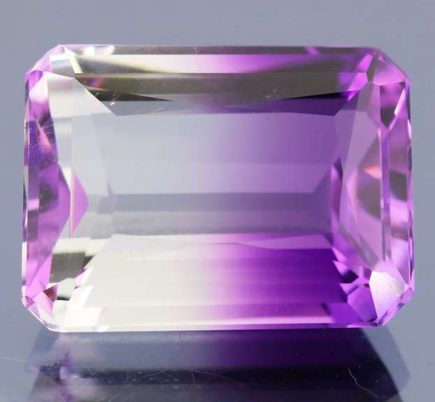 Beautiful 25.73ct top color created Ametrine