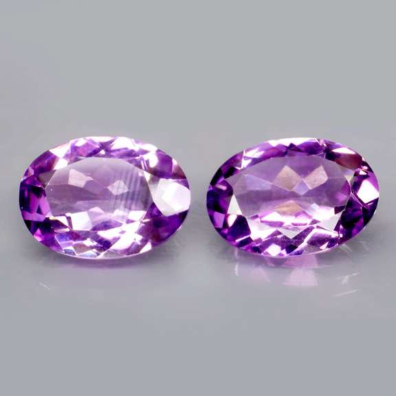 Glittering 8.78ct violet Amethyst pair