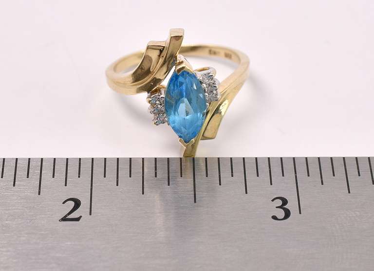 Angelic Blue Topaz with Diamonds Ring In Yellow Gold