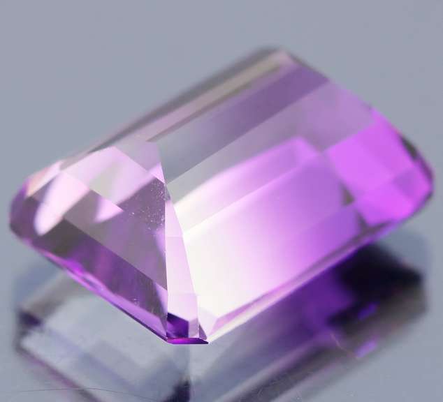 Beautiful 25.73ct top color created Ametrine