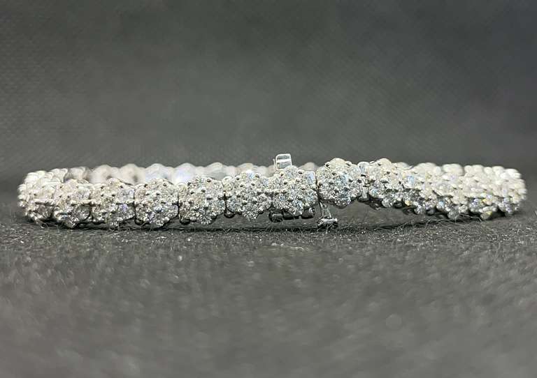 6.50 CARATS T.W. FLORAL ROUND DIAMOND TENNIS BRACELET IN 14K WHITE GOLD