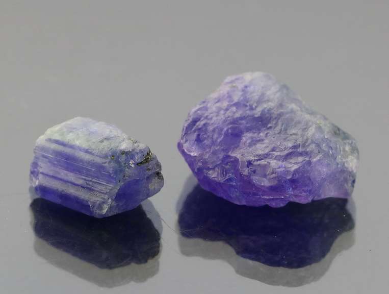 Stunning 36.43ct rich blue violet uncut Tanzanite pair