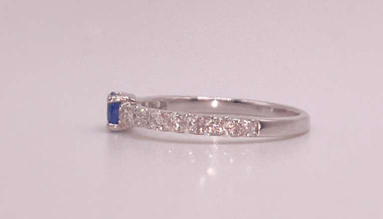 Forlorn Sapphire 18k White Gold Ring flanked with Diamonds
