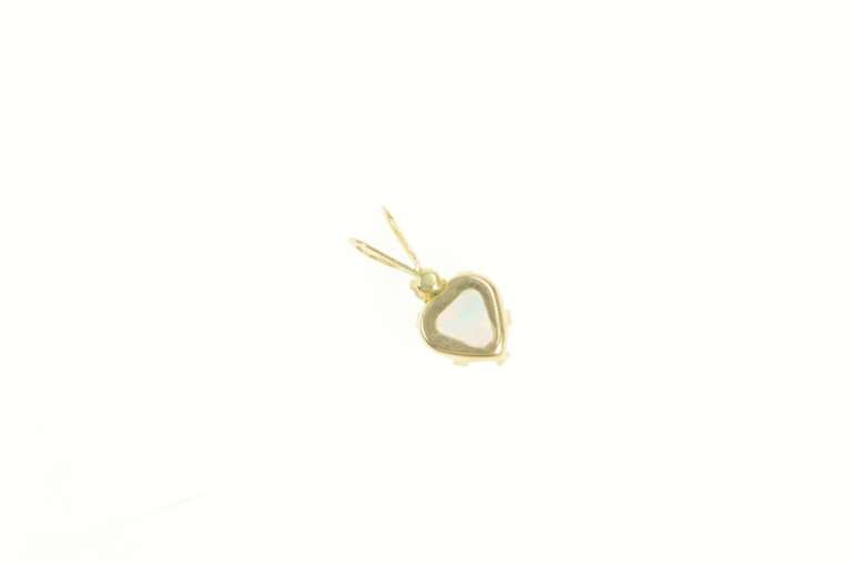 10K Yellow Gold Heart Syn. Opal CZ Accent Love Symbol Pendant