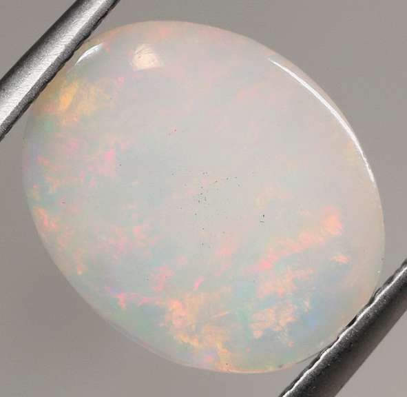 Beautiful 2.40ct rolling floral flashing Welo Opal