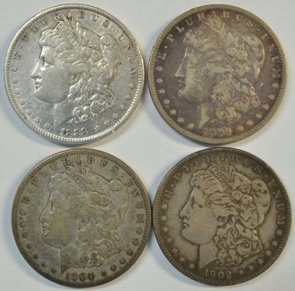4 Different nicer upper end circulated Morgan Silver Dollars