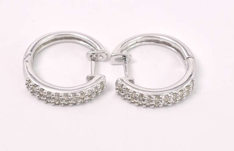 Simple Pair of Diamond Earrings In 14K Yellow Gold