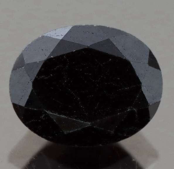 Mysterious 3.46ct blue black oval cut Sapphire