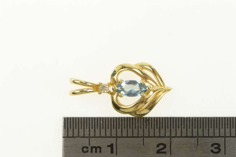 14K Yellow Gold Marquise Blue Topaz Diamond Accent Heart Pendant