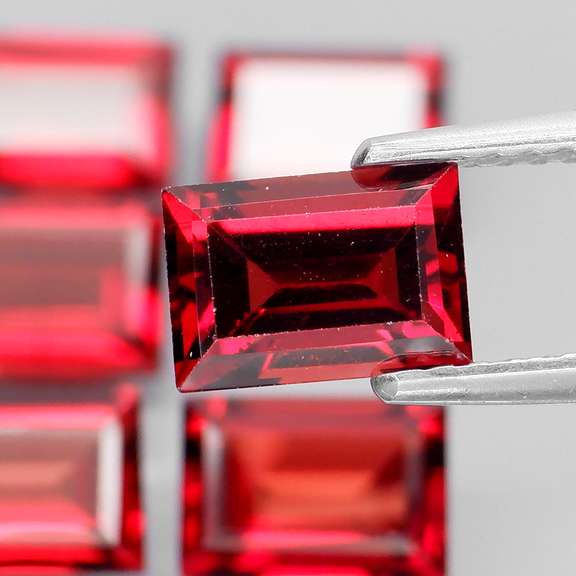 Nice 7.85ct baguette cut cherry red Garnet set