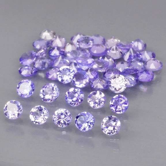 Heavy flashing 4.07ct diamond cut Tanzanite set