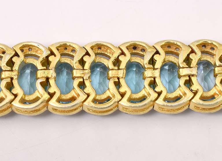 Fantastic Brand New European 35.00CTW Oval Cut Sky Blue Topaz & 4.00CTW Diamond Bracelet in Gold Plated Sterling Silver
