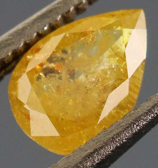 Rare .40ct pear cut golden Diamond