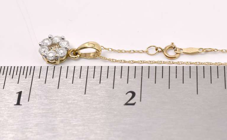 Fancy Floral Diamond Pendant in Yellow Gold