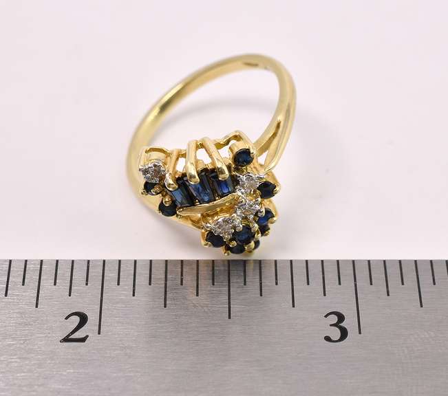 Striking Blue Sapphire with Diamonds Ring in 14K Yellow Gold