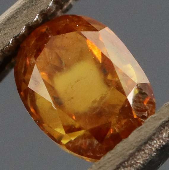 Stunning .33ct oval cut amber Diamond