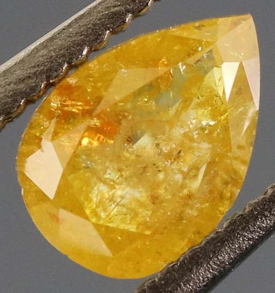 Rare .40ct pear cut golden Diamond
