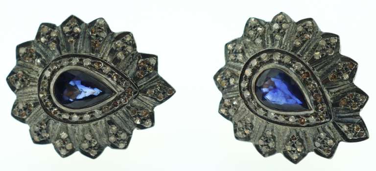 Intricate Teardrop Sapphire Earrings with Elegant Dark Silver Backdrop and Diamond Accents