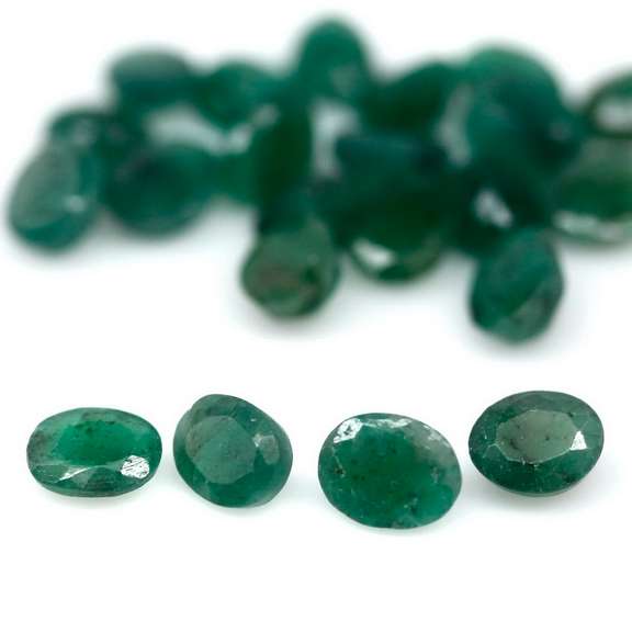 Oval cut 8ct Zambian Emerald set