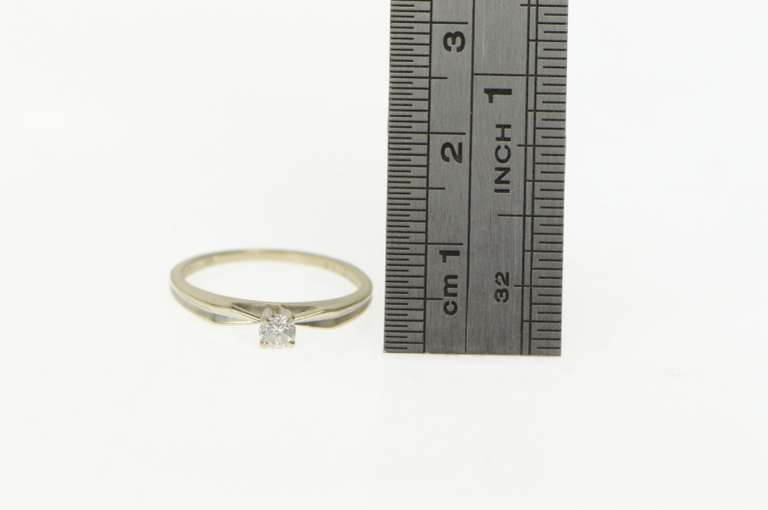 14K White Gold 0.15 Ct Round Brilliant Cut Diamond Solitaire Ring